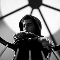 Porter Robinson smiling during a festival set