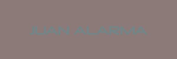 JUAN ALARMA Logo