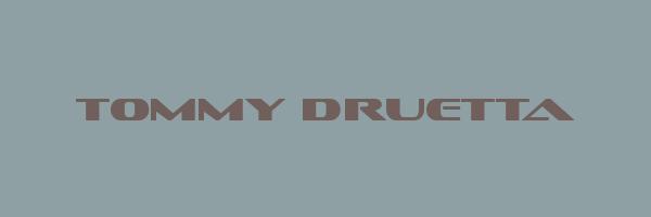 TOMMY DRUETTA Logo