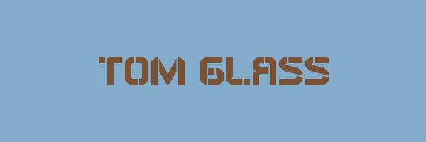 TOM GLASS Logo